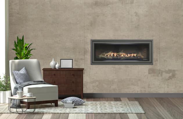 SLR-X Balanced Flue Gas Fireplace next to designer chair