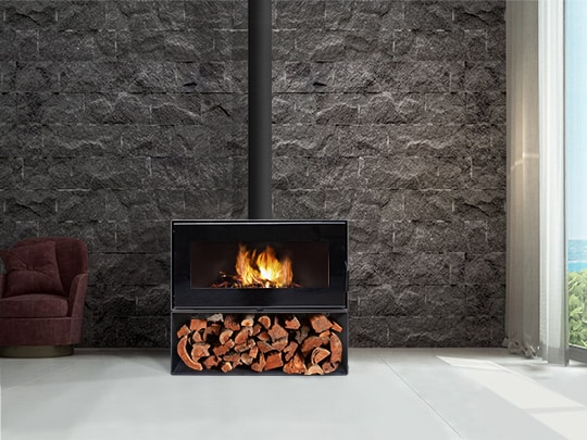 VisionLINE Taurus slow combustion wood fireplace with wood stack