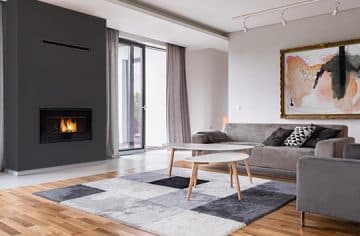VisionLINE Taurus wood fireplace in relaxing modern living room
