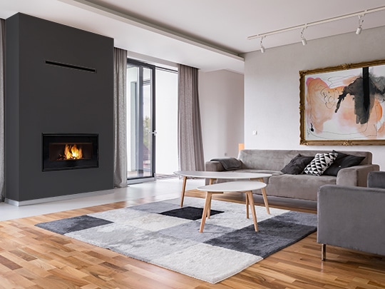 VisionLINE Taurus wood fireplace in relaxing modern living room