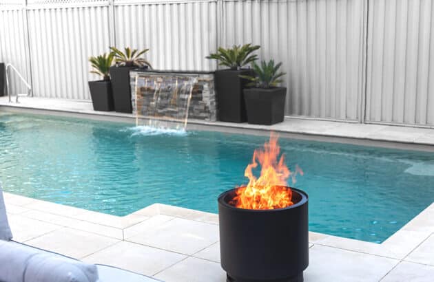 VisionLINE Firepit next to the pool